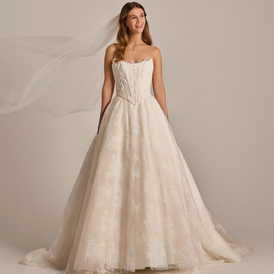 Allover Lace bridalgown and cat-eye corsage | LILLY