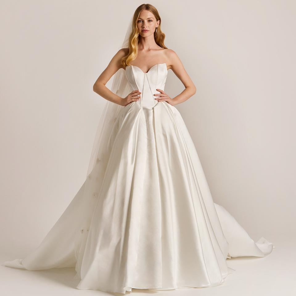 Clean Chic Satin Bridalgown with cateye corsage